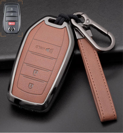 Kollen US 3-button Toyota key fob cover for Corolla, Highlander, Tacoma, showing black protective case with keychain attachment.