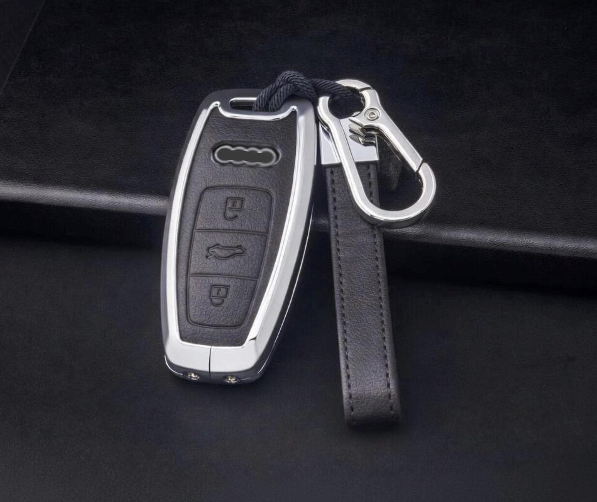 Leather and aluminum Audi key fob cover for A4 to E-Tron models, stylish keychain accessory by Kollen US.