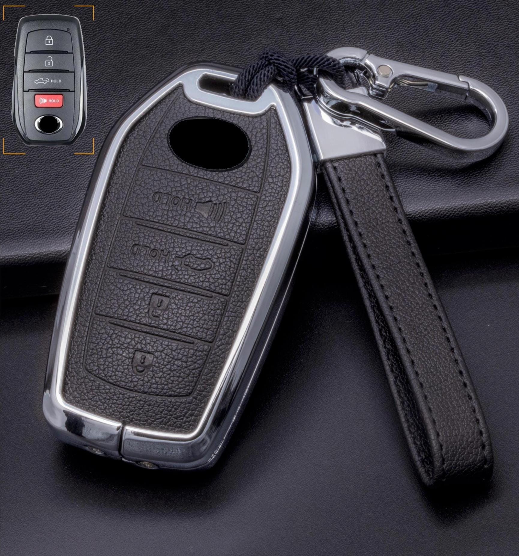 Customizable leather Toyota key fob cover with aluminum shell and keychain, featuring 4-button design by Mestiere Coriaceo.