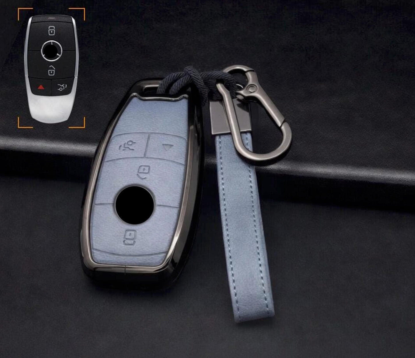 Customizable leather and aluminum Mercedes-Benz key fob cover set with keychain by Mestiere Coriaceo, featuring stylish design and branding