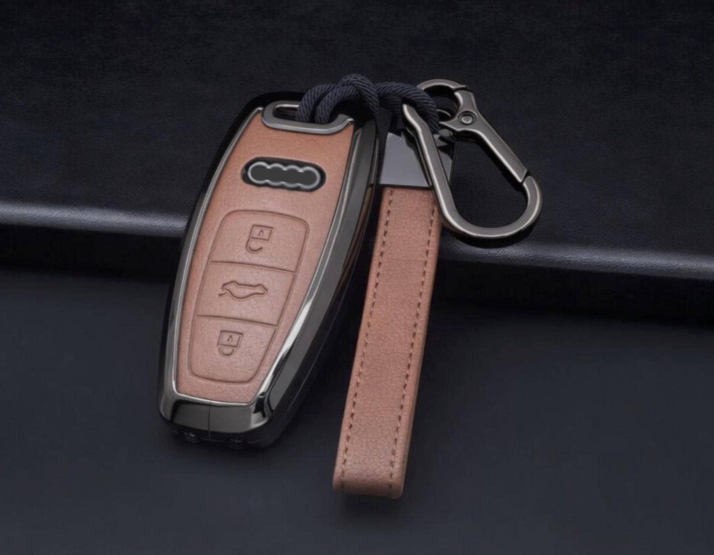 Audi key fob cover by Kollen US featuring leather and aluminum, designed for A4-A8, Q5, Q8, RS, and E-Tron models.