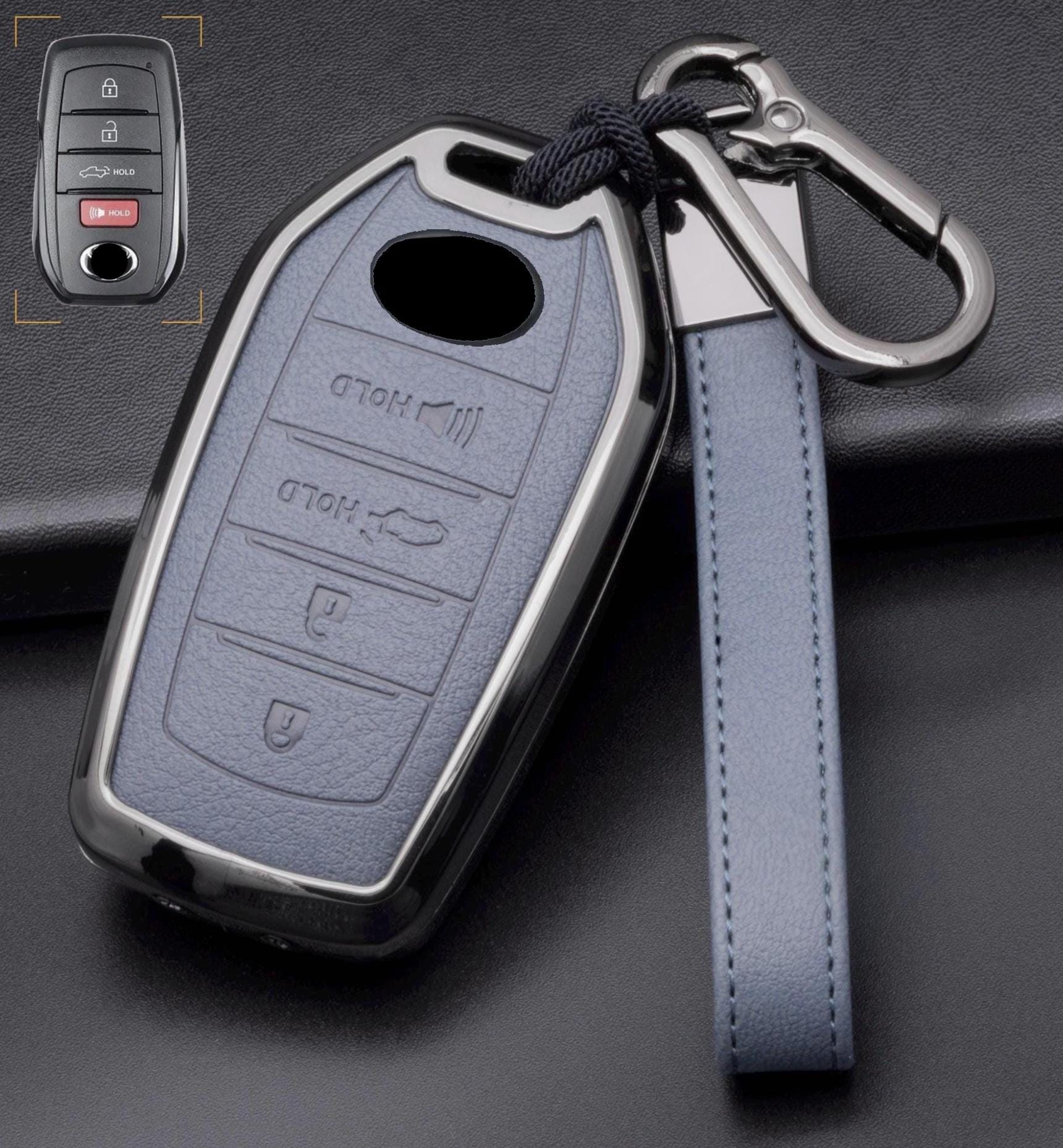 Toyota leather key fob cover with aluminum shell and keychain, customizable 4-button design by Mestiere Coriaceo.