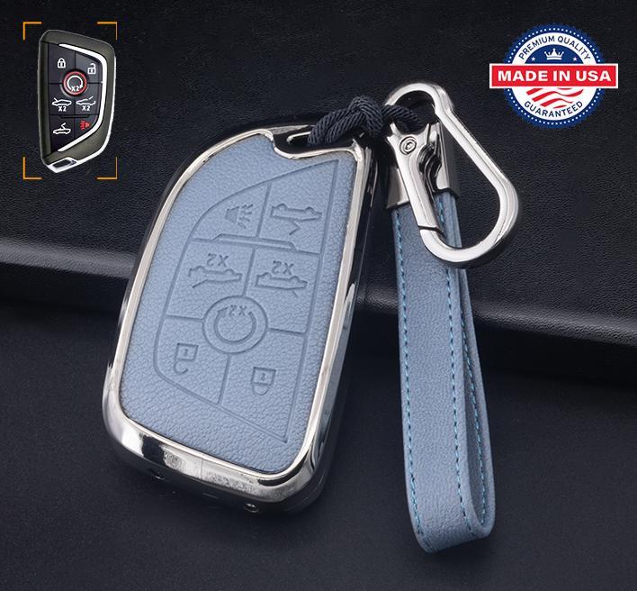 Brown leather and gunmetal aluminum Corvette C8 key fob cover with 7-button design and keychain set, customizable for 2020–2024 models.