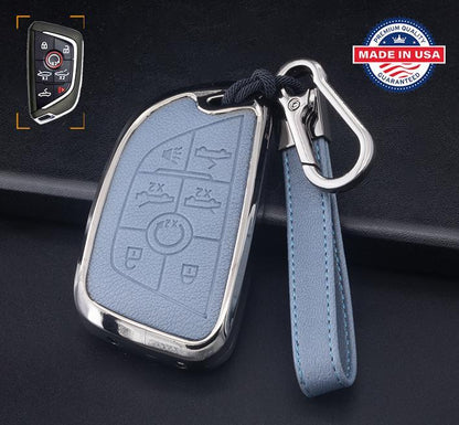 Brown leather and gunmetal aluminum Corvette C8 key fob cover with 7-button design and keychain set, customizable for 2020–2024 models.