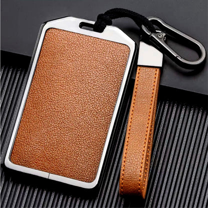 Kollen US leather and aluminum keychain cover for Tesla, Rivian, Volvo EX30 RFID key cards with keyring attachment.