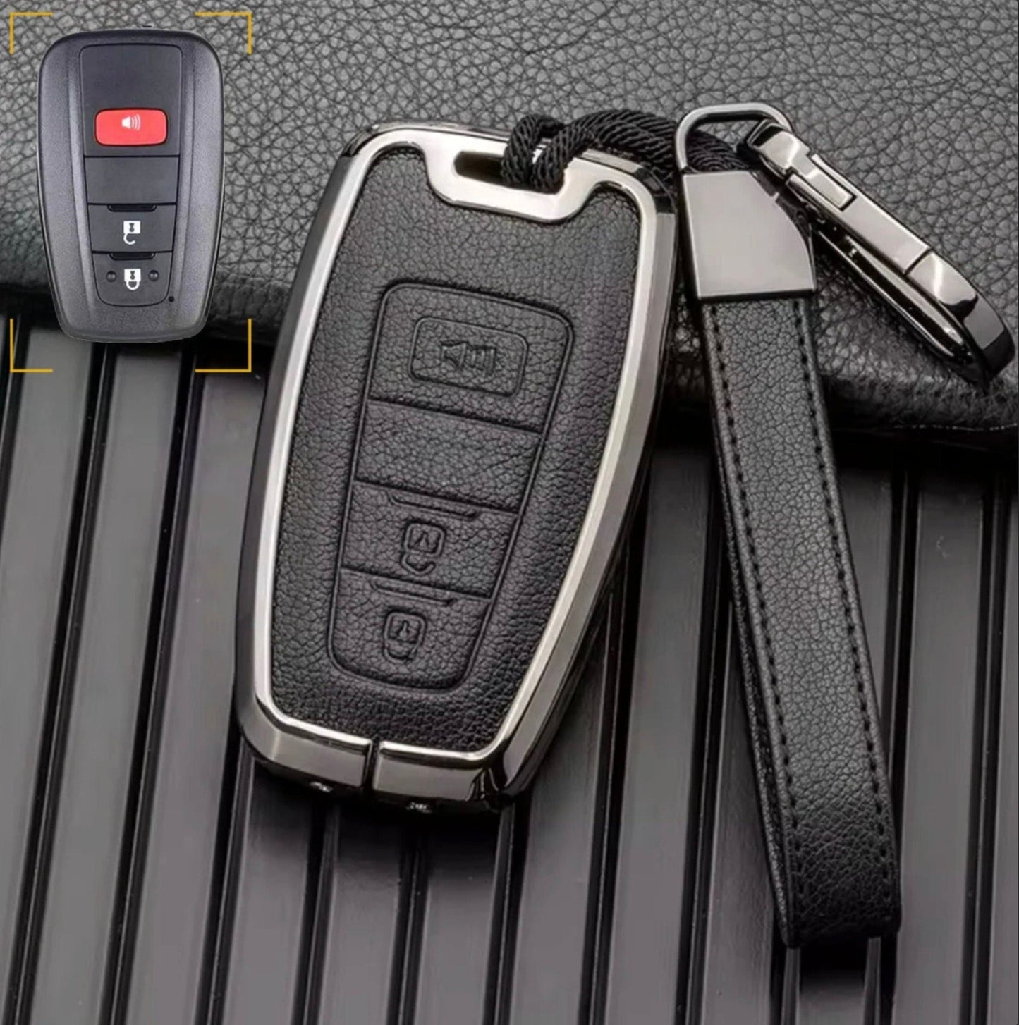 Brown leather and chrome customizable Toyota key fob cover with aluminum keychain for 3-button key fobs by Mestiere Coriaceo.