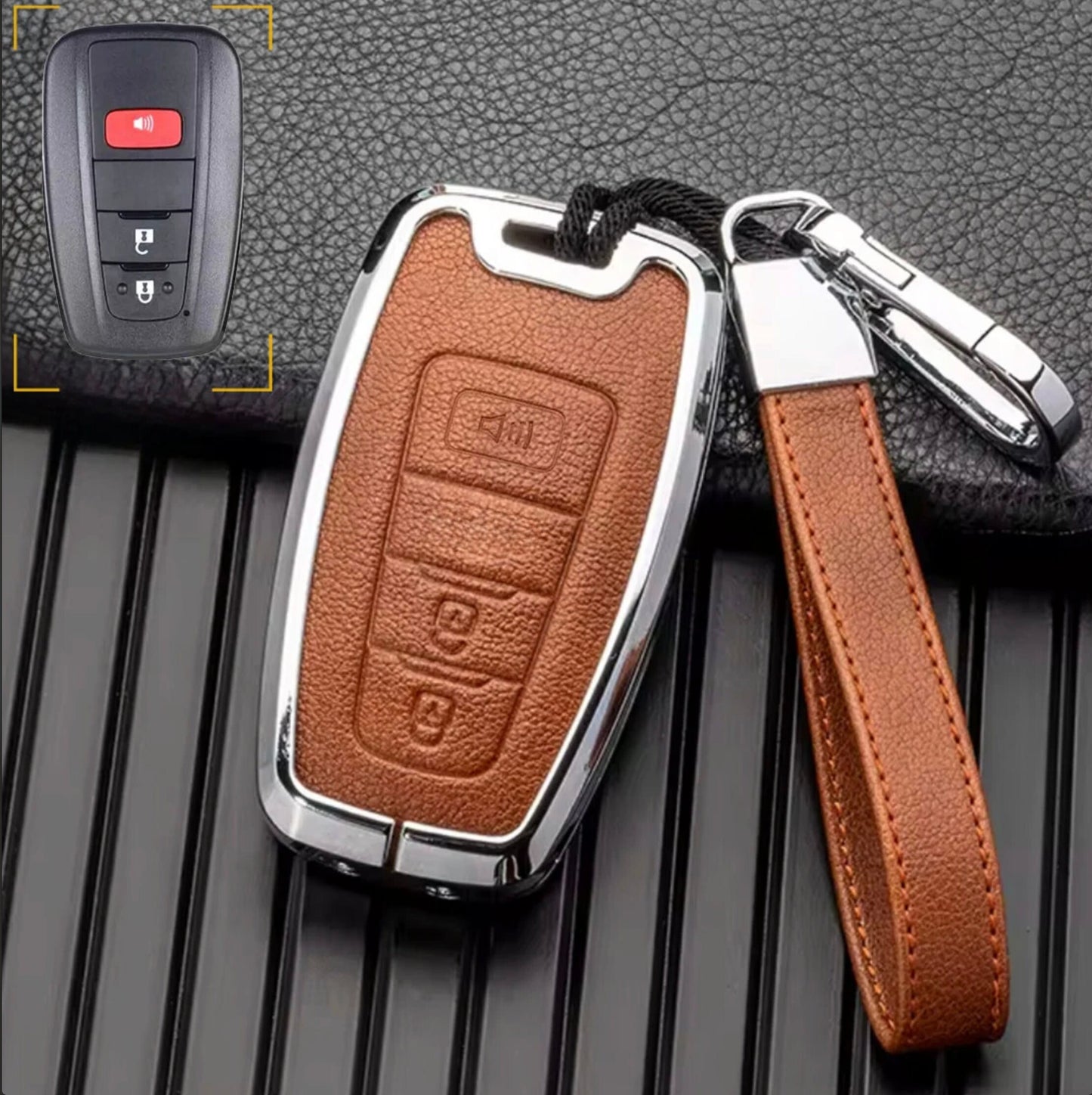 Customizable brown leather and chrome aluminum Toyota key fob cover with keychain for 3-button keychains by Mestiere Coriaceo.