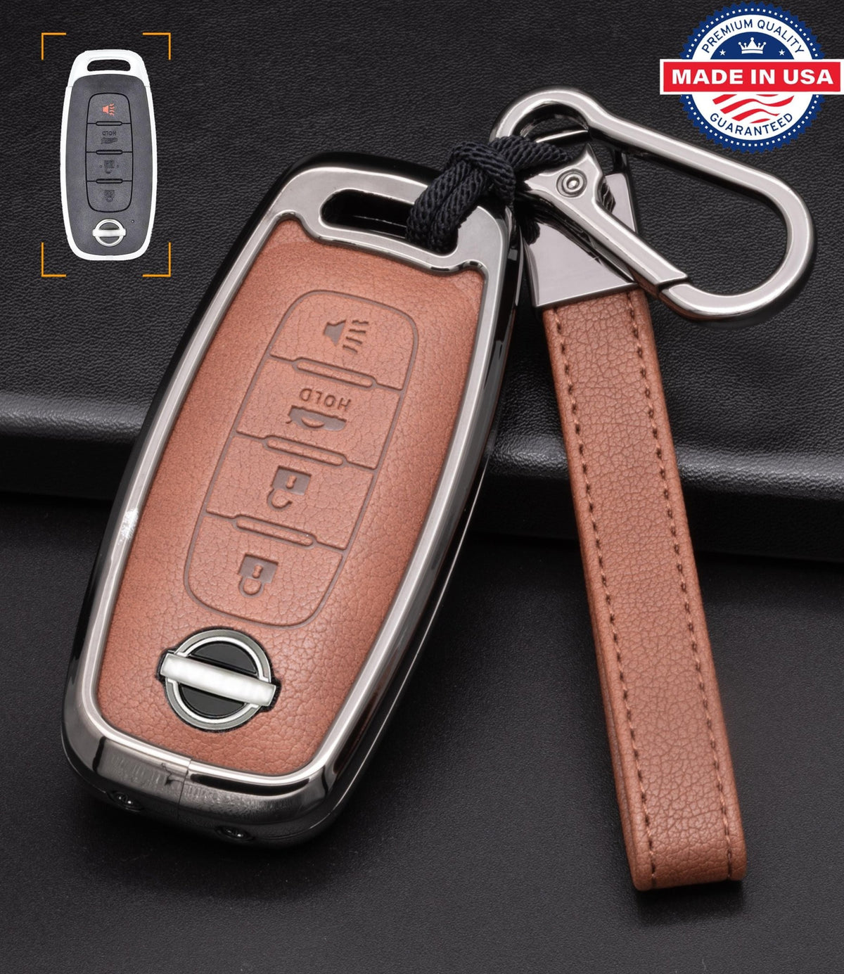 Brown leather Nissan key fob cover with aluminum shell and keychain, featuring engraved details and 4-button design.