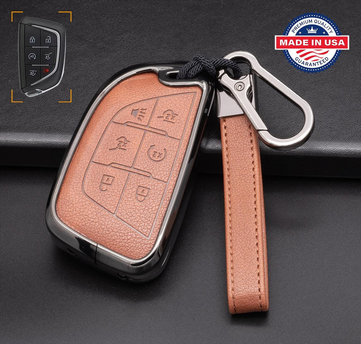 Brown leather and gunmetal aluminum Cadillac key fob cover with keychain, customizable 6-button design by Mestiere Coriaceo.